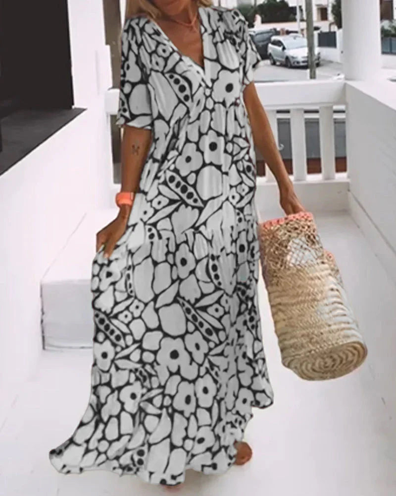 Lovia - Losse jurk met V-hals en print
