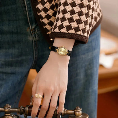 Reloj dorado Lucia