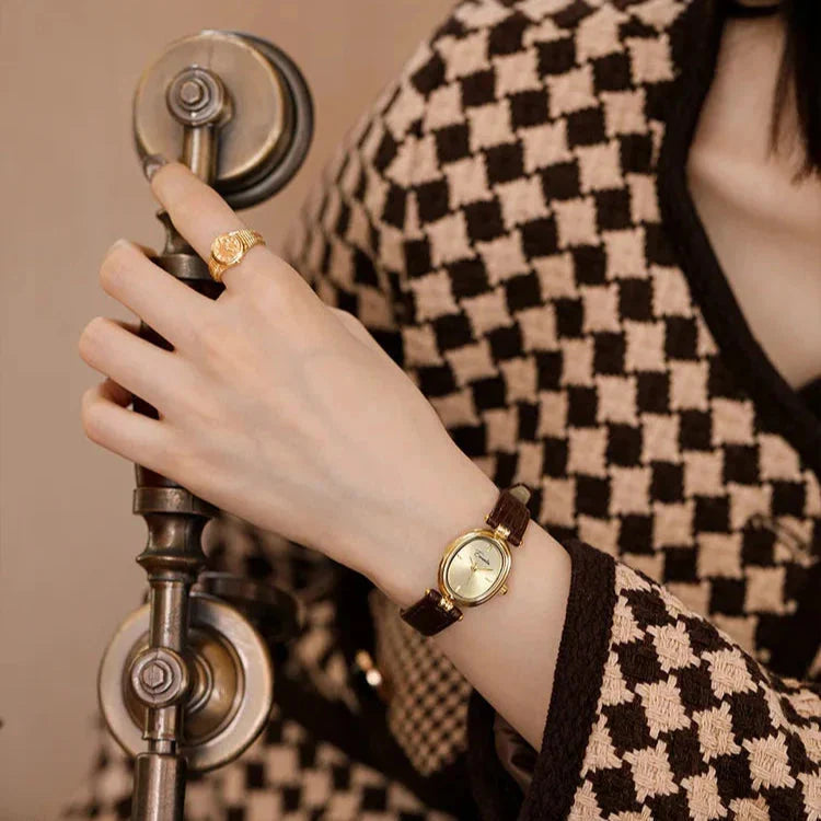 Reloj dorado Lucia